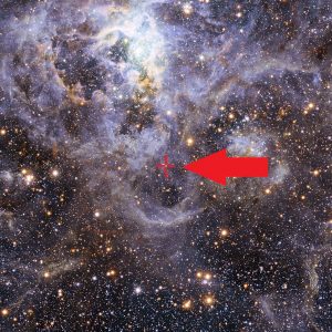 This image shows the location of VFTS 352 — the hottest and most massive double star system to date where the two components are in contact and sharing material. The two stars in this extreme system lie about 160 000 light-years from Earth in the Large Magellanic Cloud. This intriguing system could be heading for a dramatic end, either merging to form a single giant star or forming a binary black hole. This view of the Tarantula star-forming region includes visible-light images from the Wide Field Imager at the MPG/ESO 2.2-metre telescope at La Silla and infrared images from the 4.1-metre infrared VISTA telescope at Paranal.