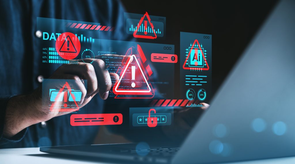 Muž interagujúci s digitálnymi červenými výstražnými ikonami a dátovou grafikou